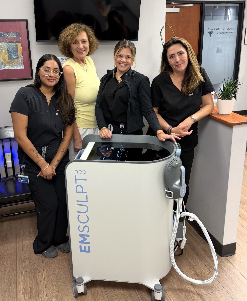Dr. Onat and her team standing with the Emsculpt Neo machine at Body by Onat in Morristown, NJ